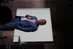 A speaker presenting at an Experience Cafe event