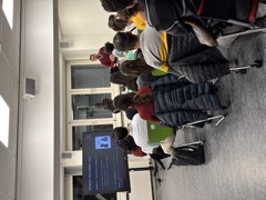The room filling up before an Experience Cafe session
