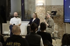 Hosts opening an Experience Cafe session