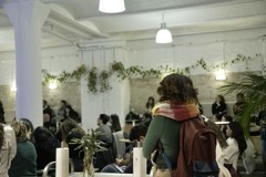 An Experience Cafe gathering in a plant-filled Berlin space